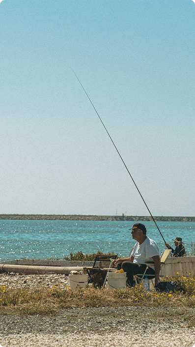 Fisherman by the sea